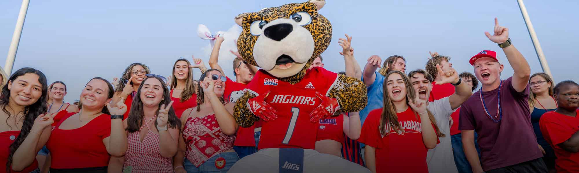 Jaguar fans in the stands with South Paw