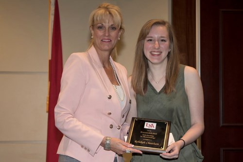 Sheri Naramore of ExxonMobil presents the 2018 ExxonMobil Scholarship Award to Rebekah Cheatham.