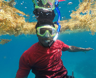 Marine science student underwater snorkeling.