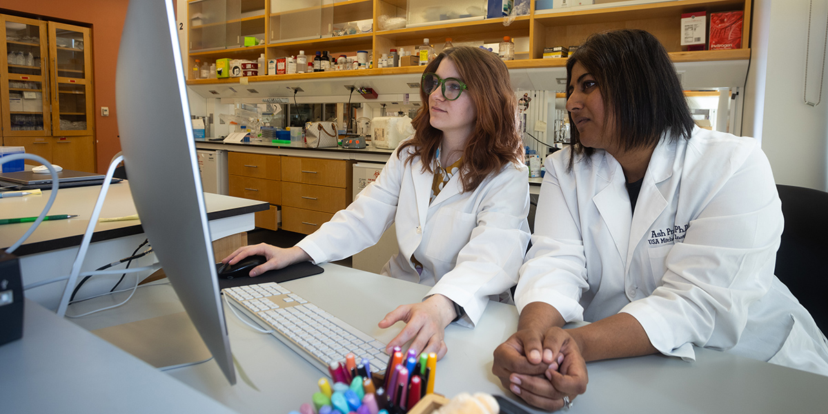 Dr. Ash Prakash and graduate student Megan Patterson