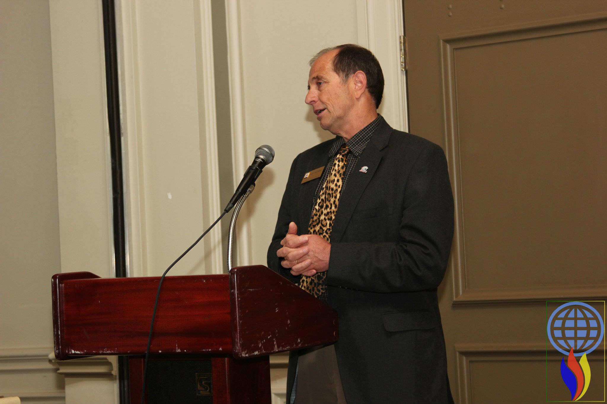 Presenter speaking at podium