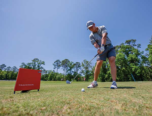 Student using tracker for golf.