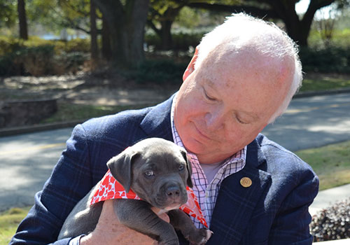 President Jo Bonner and a puppy