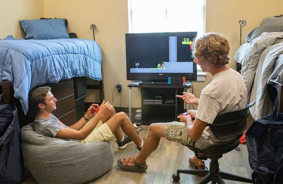 Two male roommates in their room