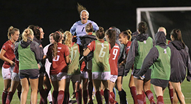 Girls soccer team celebrating