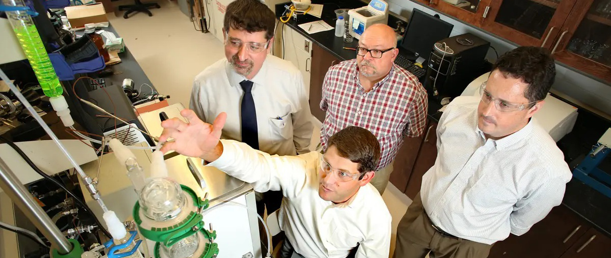 L-R: Matthew Reichert, Grant Glover (seated), James Davis, Kevin West in the laboratory.