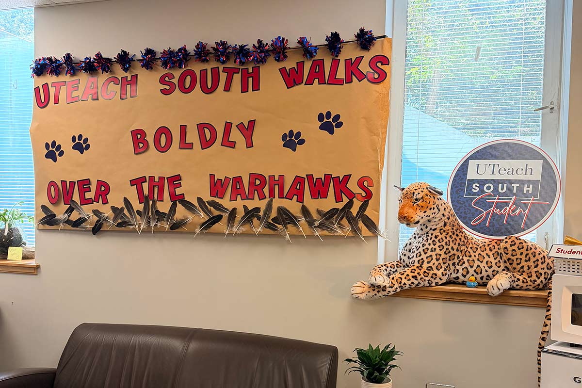 UTeach office decorated for homecoming with jaguar stuffed animal.